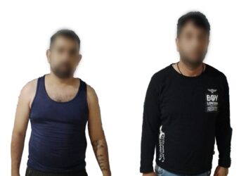 Policías Estatales aseguran a dos civiles con arma de fuego