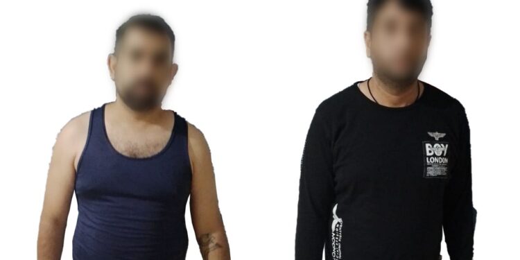 Policías Estatales aseguran a dos civiles con arma de fuego