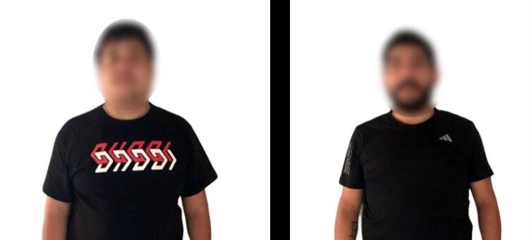 Policías Estatales aseguran a dos hombres con cargador y municiones