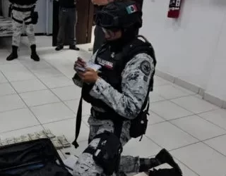 Investigan a elementos de la GN por posesión de armas y una gran cantidad de dinero en efectivo