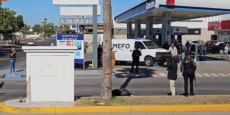 Arrojan cadáver envuelto en medio del bulevar de la Isla Musala