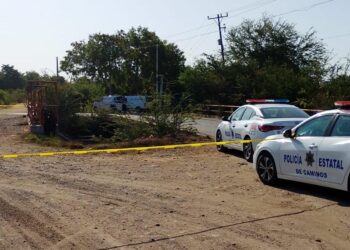 Hallan un cuerpo envuelto en plásticos negros y cinta canela en El Quemadito