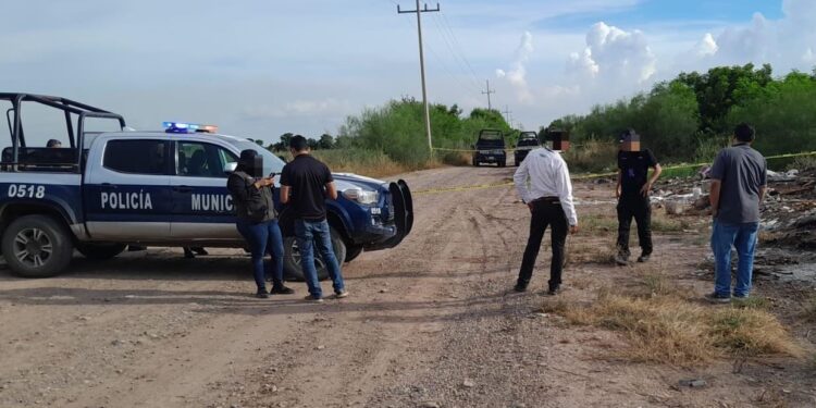 Hallan a un hombre joven asesinado a balazos en Navolato