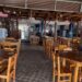 Marea alta aleja a turistas de Altata; restauranteros reportan ventas de apenas 20%